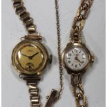 An Avia 9ct gold lady's bracelet wristwatch, the signed silvered dial with gilt Arabic numerals