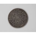 A George I shilling 1723, the reverse with 'SSC' in angles.Buyer’s Premium 29.4% (including VAT @