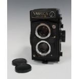 A Yashica Mat-124G twin-lens reflex camera, serial number 7083995, with Yashinon 1:3.5 f=80mm and