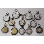 Twelve mostly silver cased key and keyless wind open-faced ladies' fob watches, one with a brooch