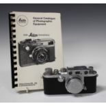 A Leica IIIc camera body, No. 437842, circa 1946/47, with Elmar f=5cm 1:3.5 lens and lens cap,