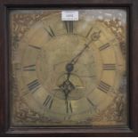 A mid-18th century oak longcase clock with thirty hour movement striking on a bell via an outside