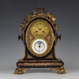 A late 19th century French ormolu mounted slate and rouge marble table clock with perpetual calendar