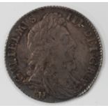 A William III shilling 1697 Norwich Mint.Buyer’s Premium 29.4% (including VAT @ 20%) of the hammer