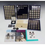 A collection of mainly Elizabeth II two pounds and one pound coin issues, a Royal Mint thirteen-coin