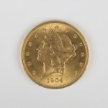 A USA gold twenty dollars 1904.Buyer’s Premium 29.4% (including VAT @ 20%) of the hammer price. Lots
