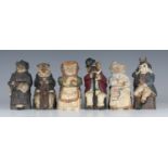A set of six Austrian anthropomorphic pottery tobacco jars and covers, 19th century, by Johann