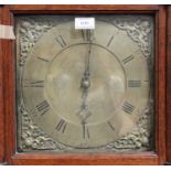 A George III oak longcase clock with thirty hour movement striking on a bell via an outside