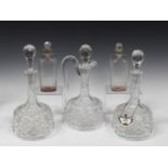 A pair of cut glass decanters and a matching ewer decanter with matched stopper, 20th century,