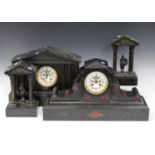 A late 19th century French slate and rouge marble cased mantel clock with eight day movement