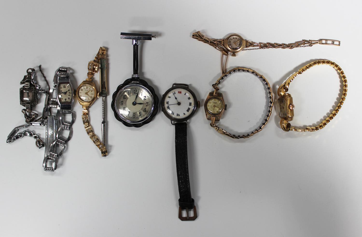 A Fortis gold rectangular cased lady's wristwatch with a signed jewelled movement, the case interior