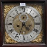 An 18th century longcase clock with eight day movement striking on a gong, the 12-inch square