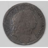 A William and Mary shilling 1693.Buyer’s Premium 29.4% (including VAT @ 20%) of the hammer price.