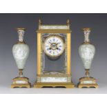 A late 19th century French ormolu, champlevé and porcelain mounted clock with eight day movement