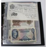 A collection of 20th century British banknotes, including a white five pound note P.S. Beale Chief