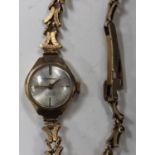 A Cortebert 9ct gold lady's bracelet wristwatch, the signed silvered dial with baton numerals,