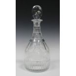 A cut glass magnum decanter and stopper, 20th century, of faceted shouldered form with triple-ringed