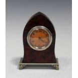 An early 20th century plate mounted tortoiseshell mantel timepiece, the dial with Arabic numerals,