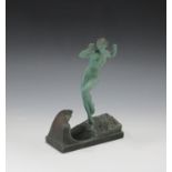 Raymonde Guerbe - an Art Deco green patinated cast spelter figure of a nude maiden trying to avoid a