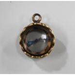 A Victorian black enamelled and gilt metal mourning pendant fob compass, the sides inscribed 'In