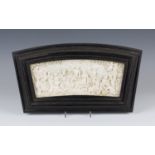 A 19th century Dieppe ivory panel of slightly curved rectangular form, finely carved in relief