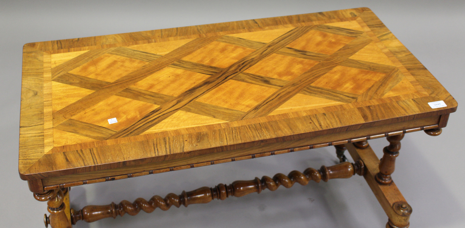 A Victorian walnut and satinwood crossbanded stretcher table, the rectangular top raised on barley - Image 3 of 3