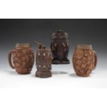 A late 19th century Swiss Black Forest carved softwood jar and cover, modelled in the form of a