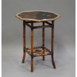 A Victorian Aesthetic period bamboo octagonal occasional table, the black lacquer top with painted