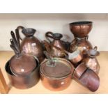 A group of mainly 19th century copperware, including three 'haystack' measures, various pans and