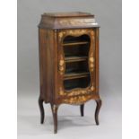 A late Victorian rosewood and foliate inlaid music cabinet, the pagoda moulded top fitted with a