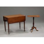 A Victorian mahogany Pembroke table, fitted with a single frieze drawer, on turned legs and castors,