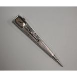 An Art Deco silver propelling pencil of tapering angular form, one side fitted with a watch and