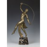 J.D. Guirande - Thyrse Dancer, an Art Deco cast bronze figure of a dancer, modelled holding a long