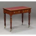 A Victorian mahogany writing table, the top inset with gilt-tooled red leather above two drawers, on