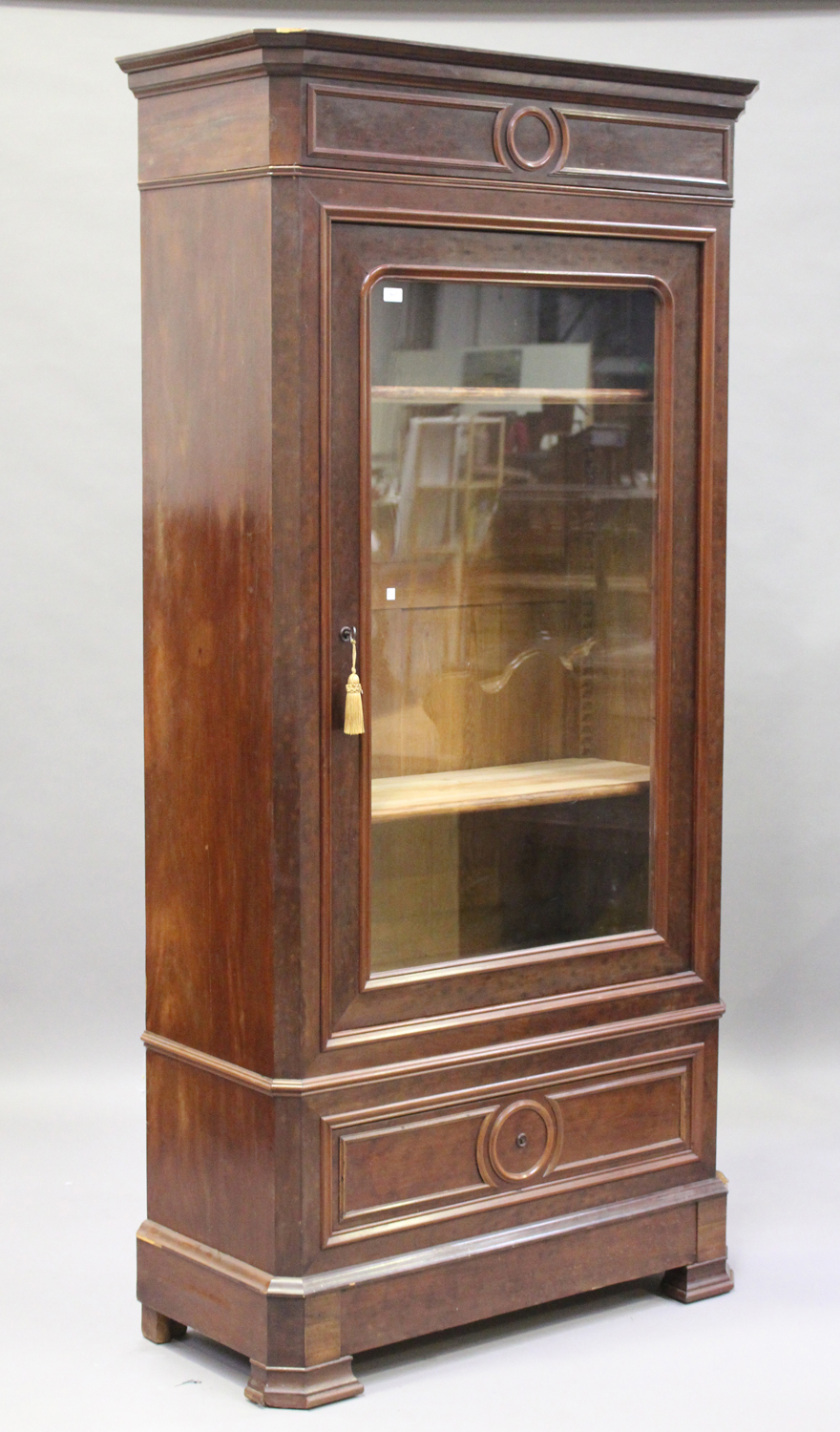 A late 19th century French walnut vitrine, the moulded pediment above an arch glazed door, the - Image 2 of 2