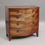 A George IV mahogany bowfront chest of two short and three long drawers, on splayed bracket feet,