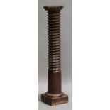 A 19th century French walnut pedestal, constructed from a large mechanical screw, height 132cm.