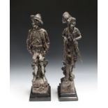 A pair of late 19th century Austrian silvered cast bronze figures of a young lady and a peasant boy,