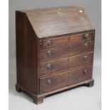 A George III oak bureau, the fall front above four graduated long drawers, on bracket feet, height