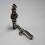 A 19th century silver fob propelling pencil in the form of a cricket bat, length 4.2cm, together