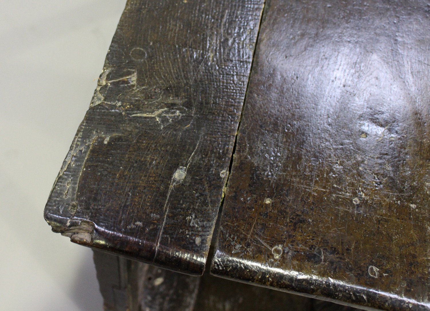 A 17th century and later oak console table, the rectangular top above a frieze with carved linenfold - Image 3 of 5