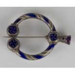 A Victorian silver, blue and white enamelled and coloured foil backed gem set brooch, probably