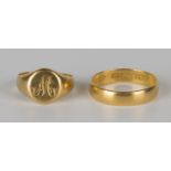 A 22ct gold plain wedding ring, ring size approx O1/2, and a gold signet ring, ring size approx K.