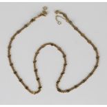 A 9ct gold multiple link neckchain with a replacement hook shaped clasp, length 42cm.Buyer’s Premium