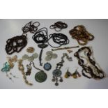 A large collection of costume jewellery, including necklaces and bangles.Buyer’s Premium 29.4% (