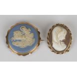 A gold mounted Wedgwood jasperware circular brooch, designed as a chariot scene, detailed 'Wedgwood'