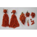 A group of coral jewellery, comprising a pair of pendant tassels, length 7cm, a brooch, designed