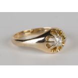 A gold and diamond single stone ring, claw set with a cushion shaped diamond, ring size approx R1/