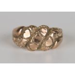 A 9ct rose gold ring with banded decoration and heart shaped motifs, Birmingham 1904, ring size