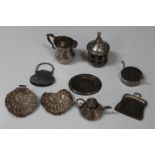 A group of Continental silver miniature items, including a jug, an oval plate, a purse and a crumb